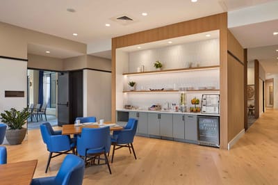 Bright and modern dining area with tables and snacks