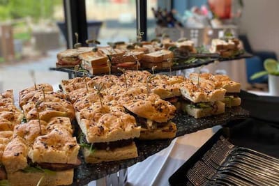 A close-up view of sandwiches on a platter