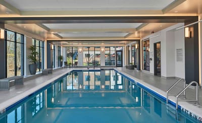 Indoor swimming pool in a bright, modern facility