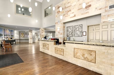 Lobby area with a reception desk and modern design