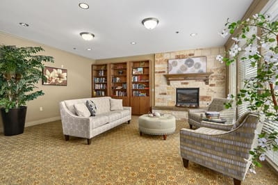 Cozy common area with seating and a fireplace