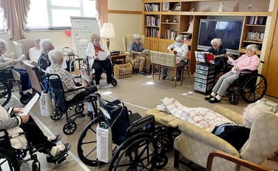 Residents engaged in a group activity in a common area