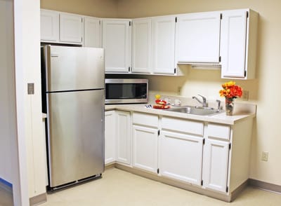 Bright kitchen area with modern appliances