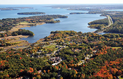 Aerial view of the scenic landscape surrounding OceanView At Falmouth