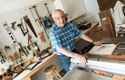 Senior man working in a woodworking shop