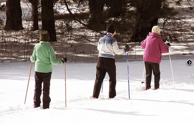 Residents enjoying a winter walk in the snow
