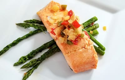 Plated salmon with asparagus and vegetables