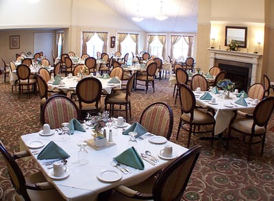 Dining room set up for a meal in the facility