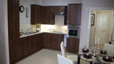Well-furnished kitchen area in a senior living facility