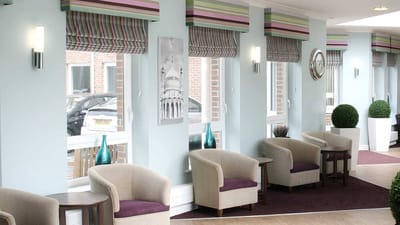 Bright interior view of a common area with seating