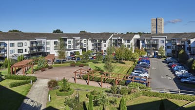 Exterior view of Pannel Croft Retirement Village with green space