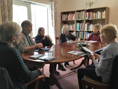 Residents engaged in a group activity in a common area