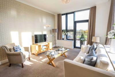 Bright common area with seating and natural light