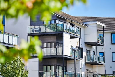 Exterior view of a residential building with balconies