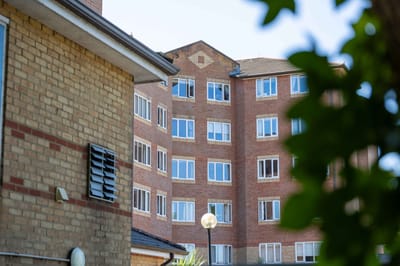 Exterior view of a residential building with landscape