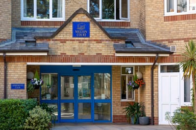 Exterior view of Melton Court Retirement Community entrance