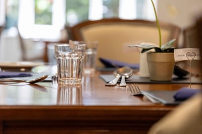 Table setting with utensils and glasses for dining