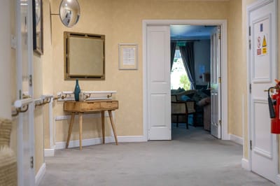 A corridor inside the retirement community with decor