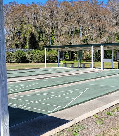 Outdoor shuffleboard courts with shaded area