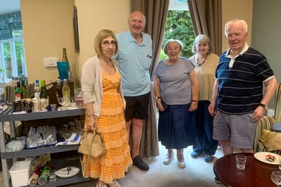 Residents gathered in a cozy common area