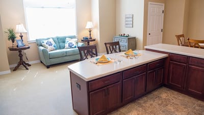 Bright common area with seating and decor