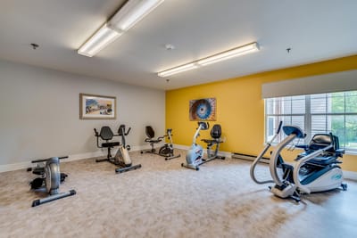 Well-equipped fitness room with exercise machines