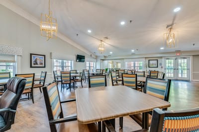 Bright dining area with tables and chairs