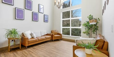 Cozy common area with seating and natural light