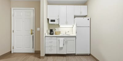 A kitchenette area in a resident's room