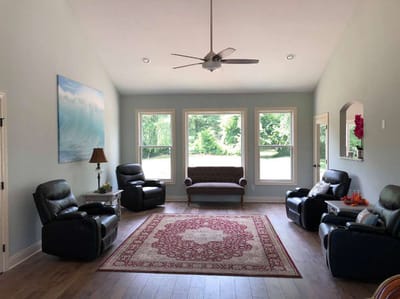 Interior common area with seating and large windows