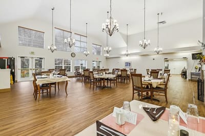Dining room setup with elegant lighting and furniture