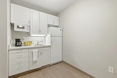 Interior kitchen area with appliances