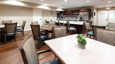 Dining area with wooden tables and chairs