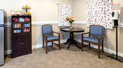 Cozy corner of a common area with seating and decor