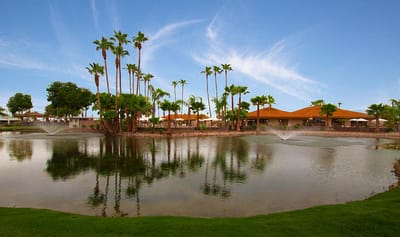 Outdoor view of the facility near a tranquil pond