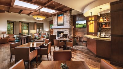 Elegant common area with seating and bar