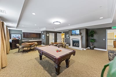Interior view of a common area with a billiards table