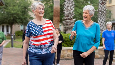Mirador, Nursing Home in Corpus Christi, TX — Seniors enjoying a joyful outdoor dance activity