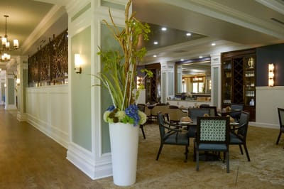 Mirador, Nursing Home in Corpus Christi, TX — Elegant dining area with decorative plants and seating