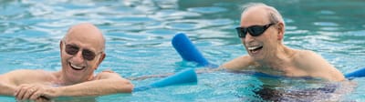 Mirador, Nursing Home in Corpus Christi, TX — Seniors enjoying a leisurely swim in a pool