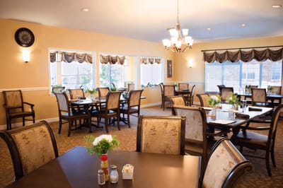 Dining area with tables and chairs set up