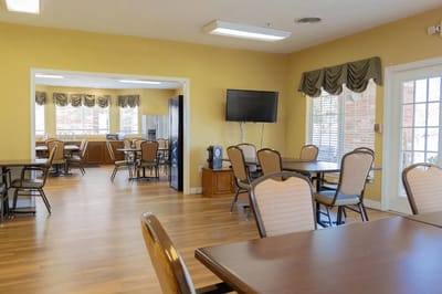 Interior common area with dining tables and chairs