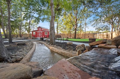 Outdoor garden area with a water feature
