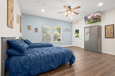 A well-furnished twin bedroom in a facility