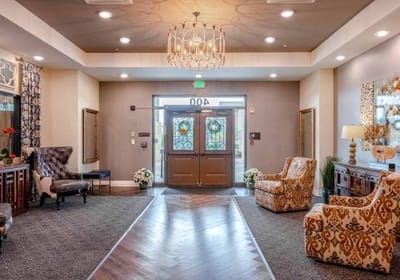 Cozy lobby area with seating and decor.