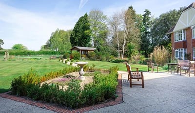 Well-maintained garden with seating area