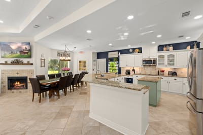 Bright and welcoming common area with a dining table.