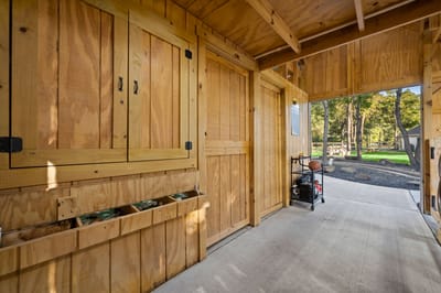 Wooden interior space leading to an outdoor area
