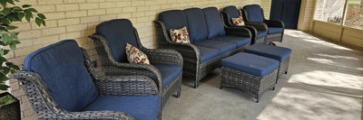 Cozy outdoor seating area with cushions.
