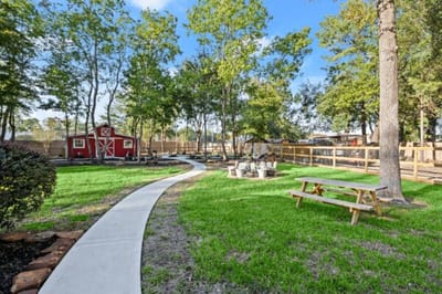 Spacious outdoor area with a pathway and seating